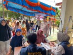 Program JALUR Polres Kuansing Hadir di Sungai Besar, Warga Dapat Sembako dan Layanan Kesehatan Gratis